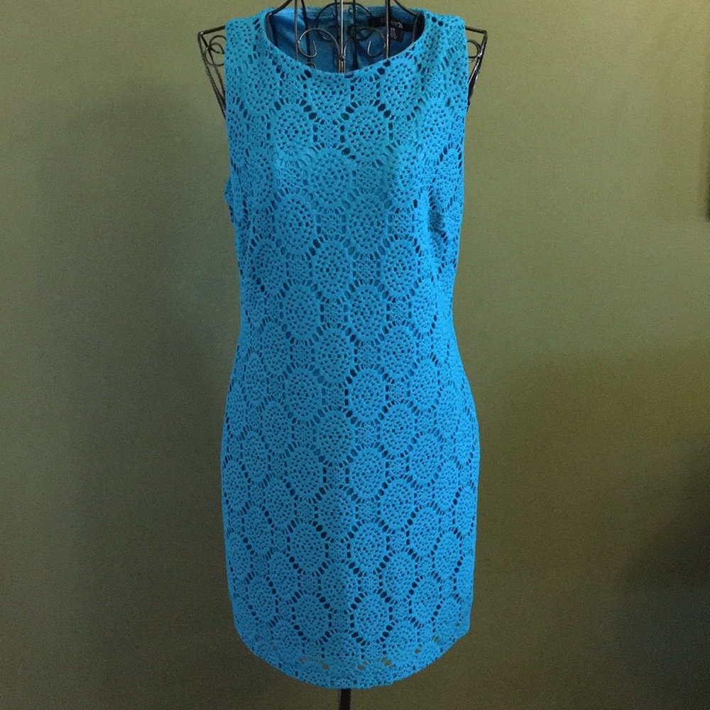 Beautiful teal sheath dress.